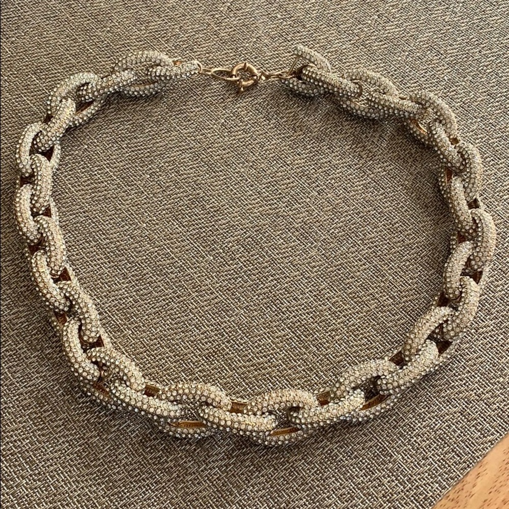 Gold chain necklace covered in pave style crystals